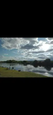 a view of a body of water with a cloudy sky at La Quina. in Villa Rumipal
