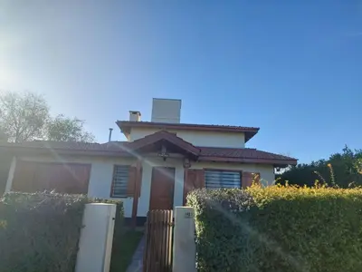 a house with a solar panel on top of it at La Casita - Chalet de Montaña in Villa General Belgrano