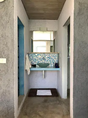 a bathroom with a sink and a mirror at Jauja in San Javier