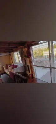 a small room with a bed and a window at Departamento próximo terminal y hospitales in Cordoba