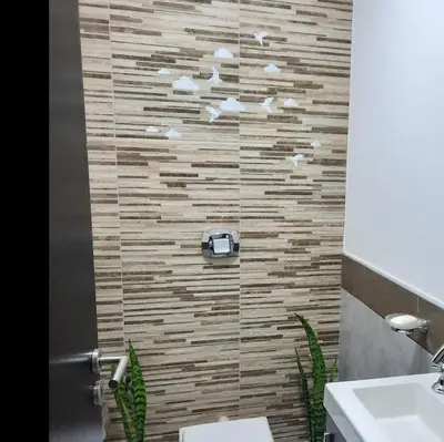 a bathroom with a toilet and a sink at Lacus. Casas de lago. in Almafuerte