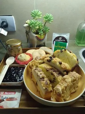 a plate of food with bread on a table at Casa Villa Alba Carpinteria in Carpintería