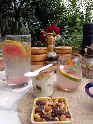 a table with bowls of food and drinks on it at Casa Villa Alba Carpinteria in Carpintería