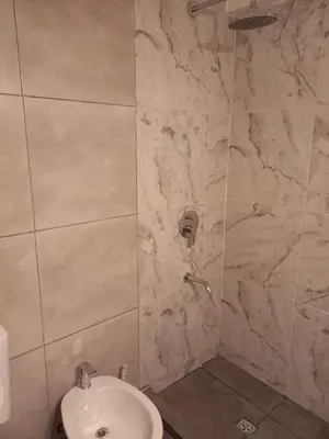 a bathroom with a shower and a sink at Departamento 1 Dormitorio - Buenos Aires 1100 - Nueva Cordoba in Cordoba