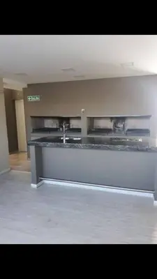 a large kitchen with a counter in a room at LOAN Nueva Cordoba categoría appart 11B in Cordoba