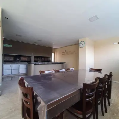 a dining room with a large table and chairs at LOAN Nueva Cordoba categoría appart 11B in Cordoba
