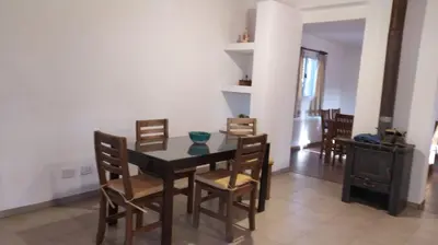 a dining room with a table and chairs at Indigo in Carpintería