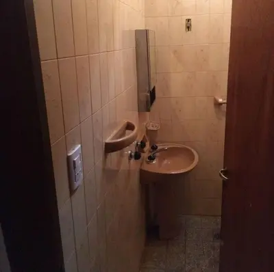 a bathroom with a sink and a toilet at Casa grande 5 pax San Antonio de Arredondo CORDOBA in San Antonio de Arredondo