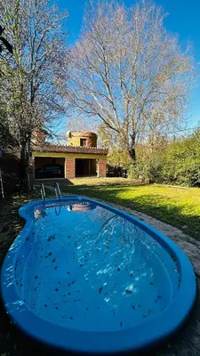 a swimming pool in the middle of a yard at Casa grande 5 pax San Antonio de Arredondo CORDOBA in San Antonio de Arredondo