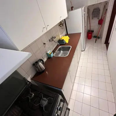 a kitchen with a sink and a counter top at Eugenio Garzón 448 in Cordoba