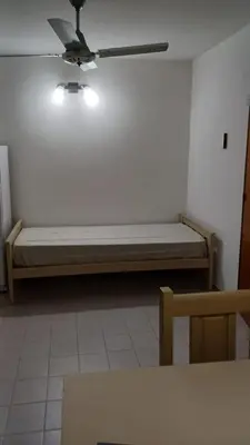 a bed in a room with a ceiling at tu lugar 1 in Cordoba