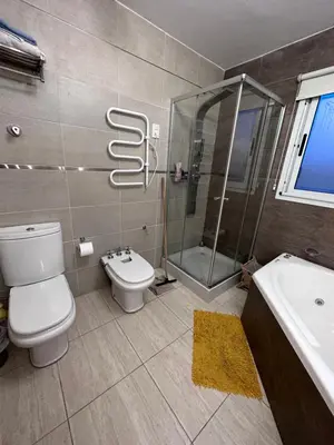 a bathroom with a toilet and a shower and a sink at Casa Valle del colibrí in Cañada La Negra