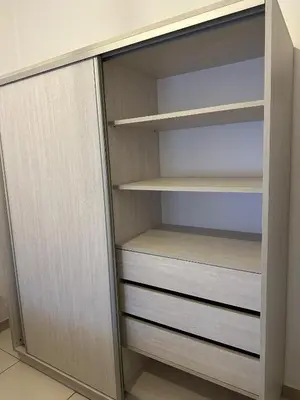 a closet with wooden shelves in a room at CASA Q Cba Zona Norte Kempes Aeropuerto Shopping cochera asador patio full equipada confortable in Cordoba