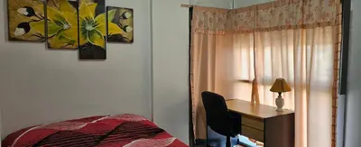 a bedroom with a desk and a bed and a desk with a chair at Departamento -Córdoba Capital- zona Centro in Cordoba