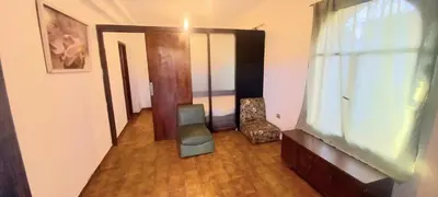 an empty room with a door and a window at La Casona in Cordoba