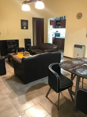 a living room with a couch and a table at Luis marcelo in Alta Gracia