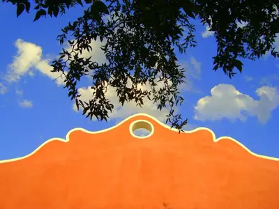 an orange building with a window on top of it at Cabañas en Piedras Maia in Merlo
