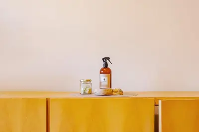 a bottle of alcohol sitting on top of a table at Departamento Centrico en Villa Carlos Paz in Villa Carlos Paz