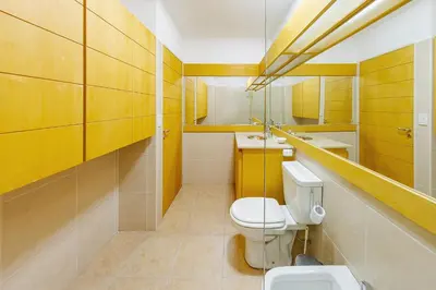a bathroom with a toilet and a sink at Departamento Centrico en Villa Carlos Paz in Villa Carlos Paz