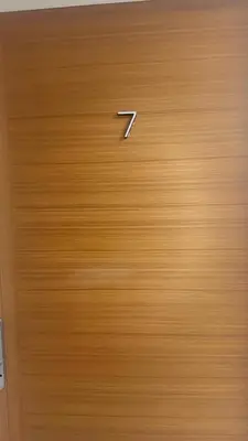 a close up of a door with a number on it at Carlos Paz-Lake Towers in Villa Carlos Paz