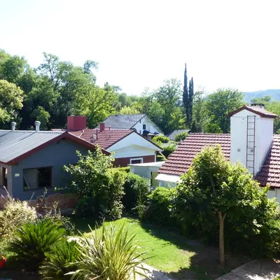 a row of houses in a suburb at Posada Ojo de Agua Villa General Belgrano in Villa General Belgrano