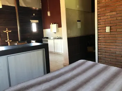a bathroom with a sink and a counter in a room at Brisas de Nono in Nono