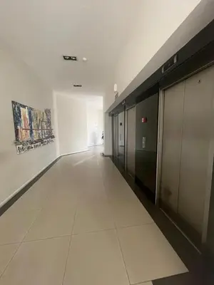 an empty hallway of an office building with a hallway at Coral State in Cordoba