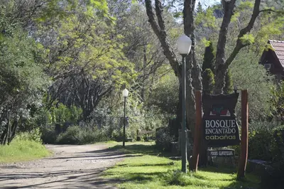 a sign for the boulevarduation authority of a park at Cabañas Bosque Encantado in Merlo