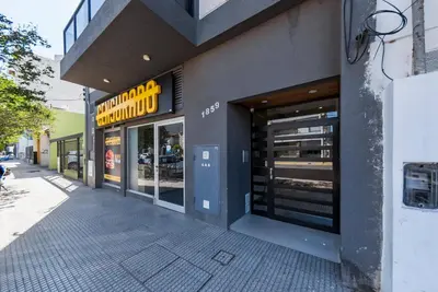 a store front of a building with a sign on it at 24 de Septiembre 1859 B Gral Paz in Cordoba