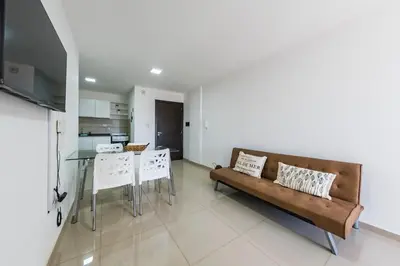 a living room with a couch and a table at 24 de Septiembre 1859 B Gral Paz in Cordoba