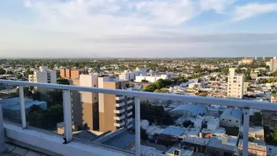 a view of the city from the balcony of a building at Home in Río Cuarto