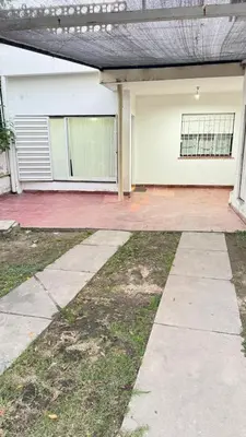 an empty driveway in front of a house at Casa zona CUCÚ de 2 dormitorios in Villa Carlos Paz