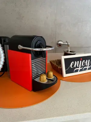 a black and red appliance sitting on a table at Complejo Moras I in Almafuerte