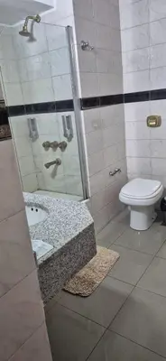 a bathroom with a shower with a toilet and a sink at Departamento NYC 2 - Edificio VILAUT by INMOVE Temporarios in Cordoba