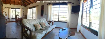 a living room with a couch and a coffee table at Yerba Buena casas de campo - Arroyo de los Patos in Nono