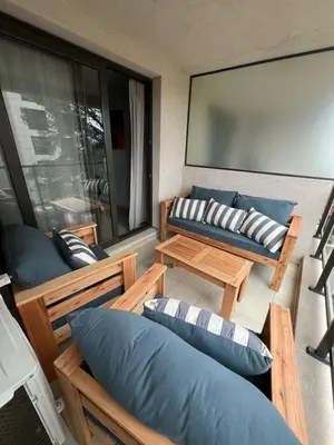 a living room with a couch and a table at Guesthouse Park in Cordoba