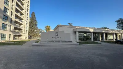 a building with a monument in front of a building at Guesthouse Park in Cordoba