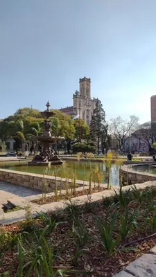 a fountain in a park with a building in the background at Tu lugar en Nueva Córdoba!A 50 mtros del Sanatorio Acongagua in Cordoba