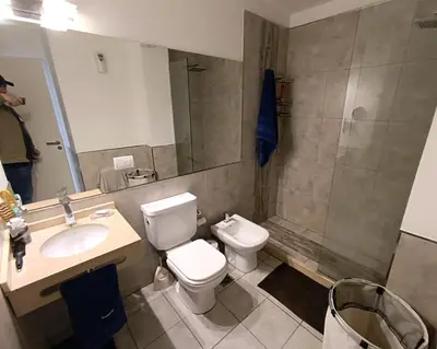 a bathroom with a toilet and a sink and a shower at ESPACIO C CRISOL Plaza España in Cordoba