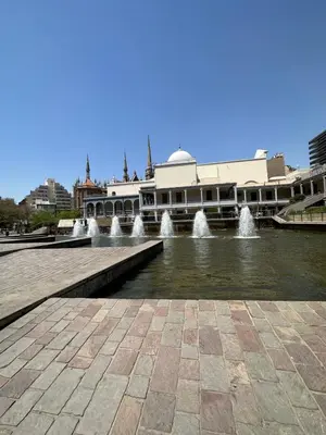 a water fountain in front of a building with buildings at Departamento premium, la mejor zona de Nueva Córdoba in Cordoba