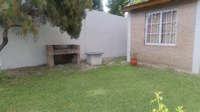 a bench sitting in the corner of a building at Cabaña el Torreon in San Ignacio
