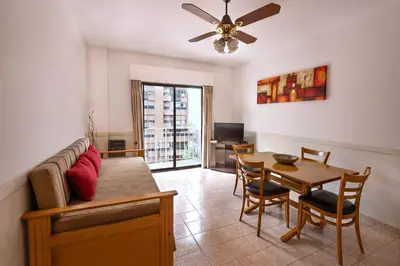 a living room with a couch and a table at Concord Rent Apart in Cordoba