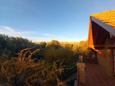 an overhead view of a house with a roof at Cabañas La Belen in Merlo