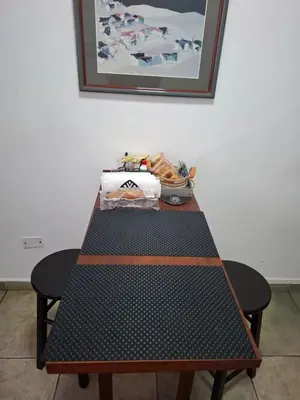 a black and brown table in a room at Loma del Alto in Alta Gracia
