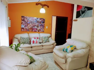 a living room with two couches and a couch at Casa Arenales in Almafuerte