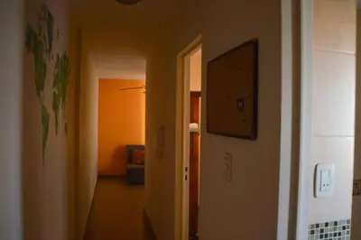 a hallway with a hallway leading to a room at Departamento en Bv. San Juan in Cordoba