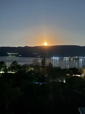 a view of a sunset over a body of water at EL PALMAR in Villa Carlos Paz