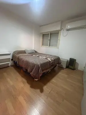 a bedroom with a bed in a room at Richardson in Cordoba