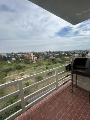 a camera on a balcony with a view of a city at Richardson in Cordoba