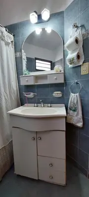 a bathroom with a sink and a mirror at Ayen Hue Casa Vacacional en Mayu Sumaj in San Antonio de Arredondo